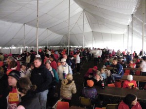 Lots of people waiting in the warm tent